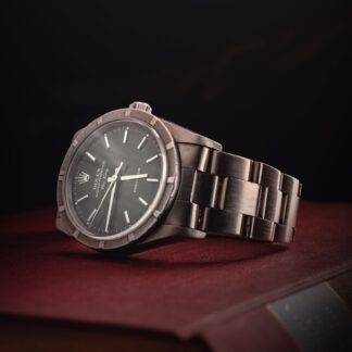 round silver-colored Rolex analog watch with link band