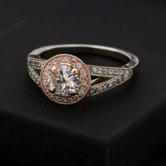 silver diamond ring on black box